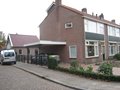 zij aanzicht hoekwoning